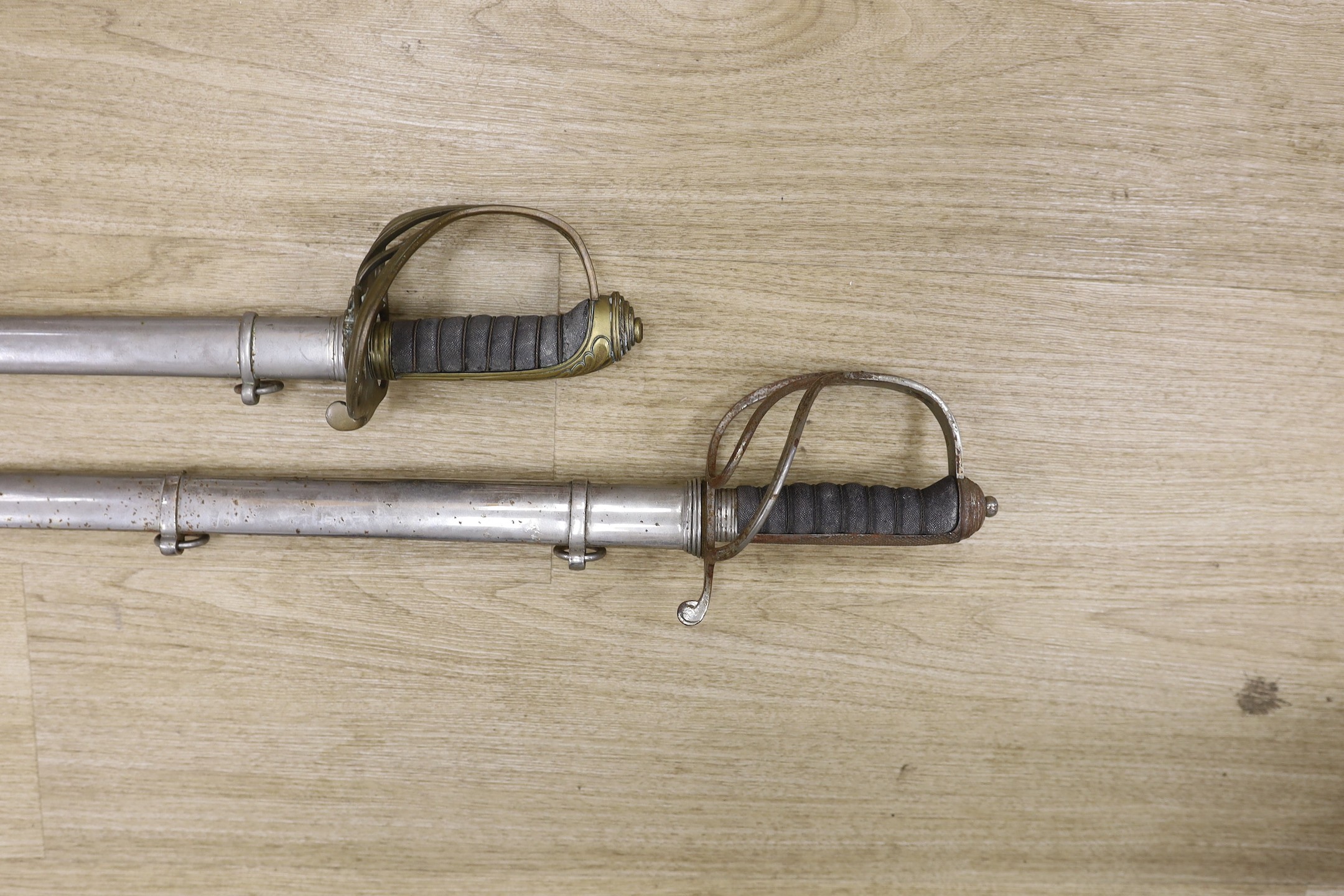 A Royal Artillery officers sword and a Hamburger Rogers & co. 1845 pattern officers sword. Both with scabbards